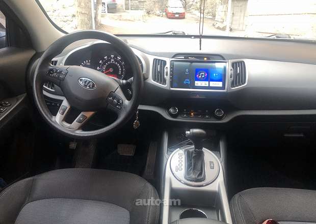Kia Sportage 2015 — լուսանկար 13
