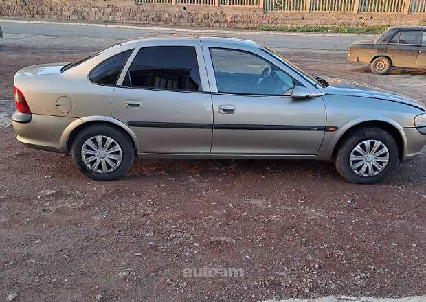 Opel Vectra 1997 — լուսանկար 7