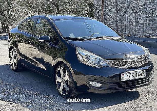Kia Rio 2013 — photo 1