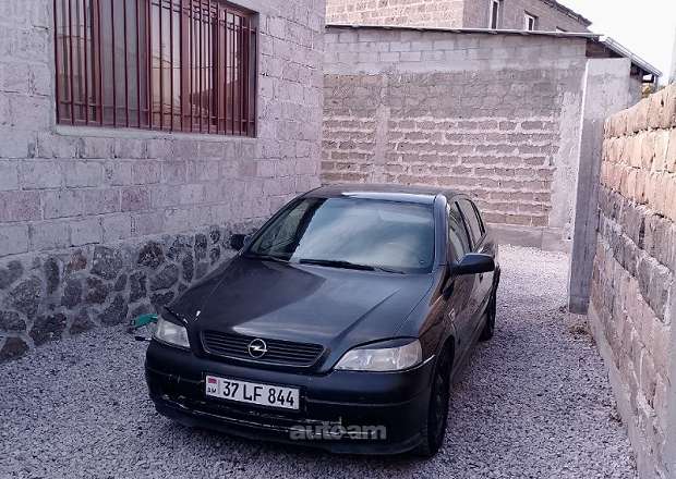 Opel Astra 1999 — լուսանկար 7