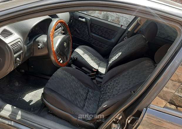 Opel Astra 1999 — լուսանկար 10