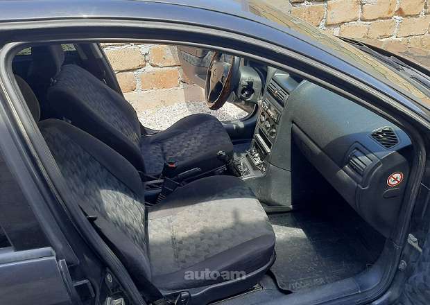 Opel Astra 1999 — լուսանկար 8