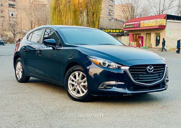 Mazda 3 2017 — photo 1