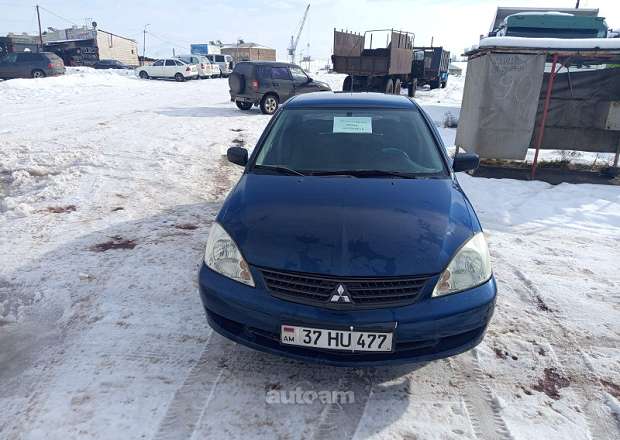 Mitsubishi Lancer 2009 — լուսանկար 2