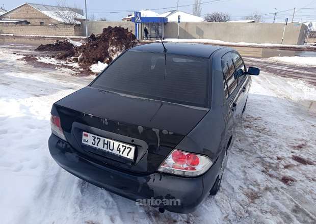 Mitsubishi Lancer 2009 — լուսանկար 5