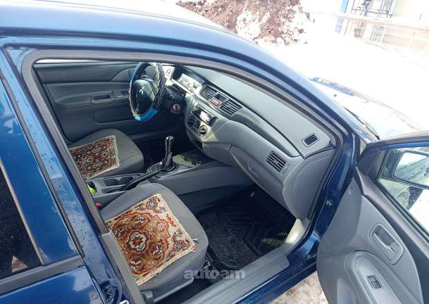 Mitsubishi Lancer 2009 — լուսանկար 4