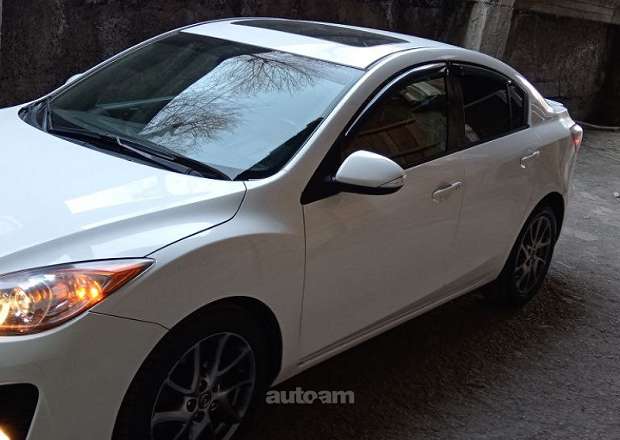 Mazda 3 2011 — photo 2