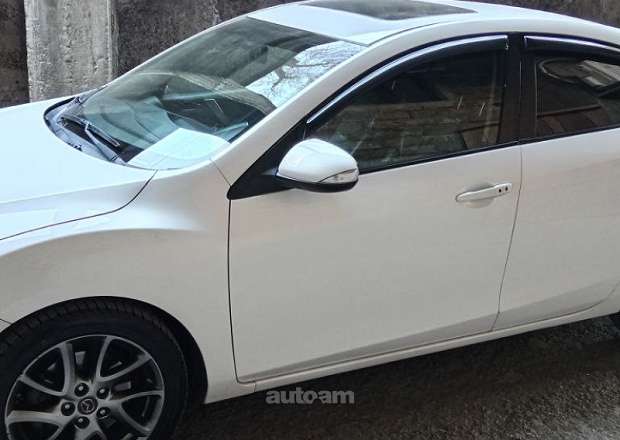 Mazda 3 2011 — photo 3