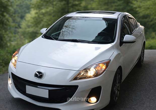Mazda 3 2011 — photo 1