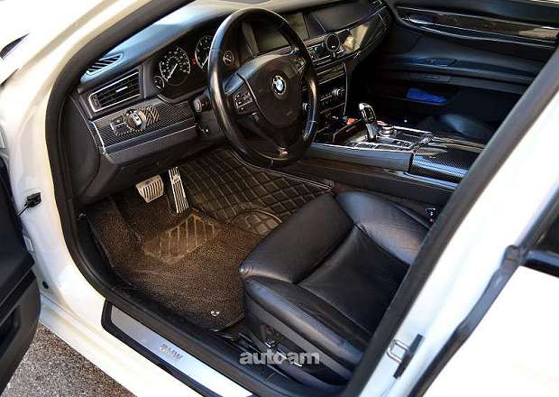 BMW 740 2010 — լուսանկար 11