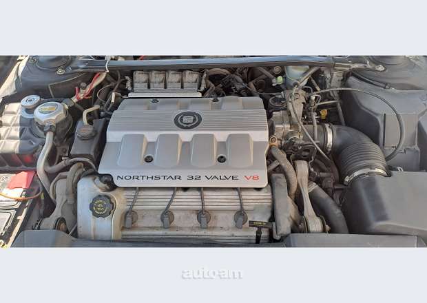 Cadillac De Ville 1999 — լուսանկար 10