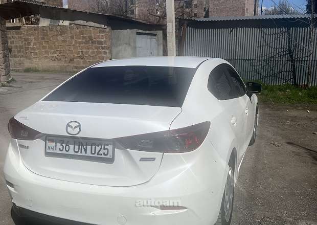Mazda 3 2015 — լուսանկար 1