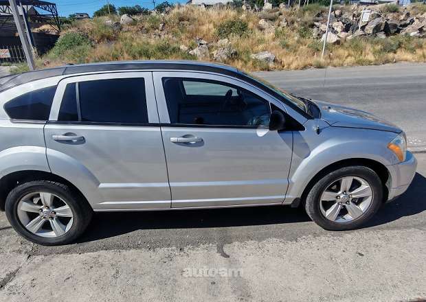 Dodge Caliber 2009 — լուսանկար 2