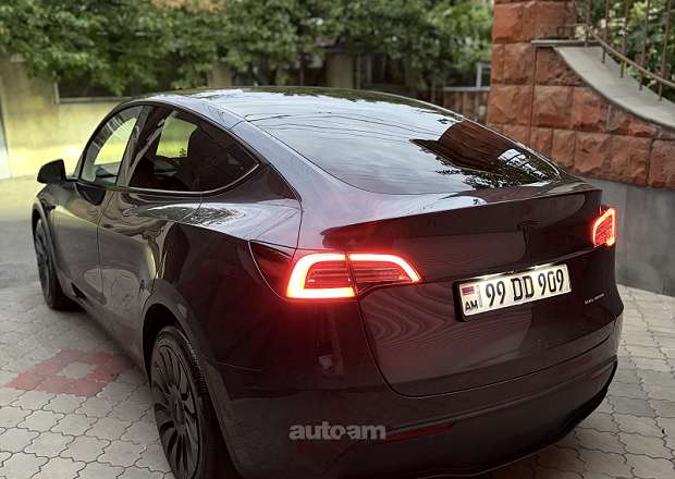 Tesla Model Y 2024 — լուսանկար 2
