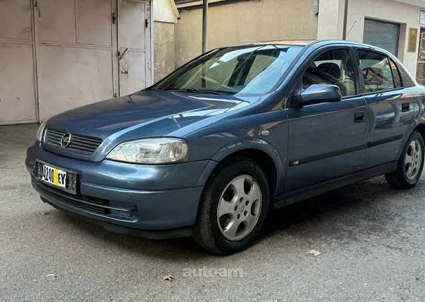 Opel Astra 1999 — լուսանկար 7