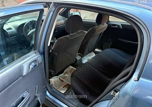 Opel Astra 1999 — լուսանկար 3