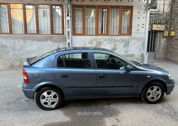 Opel Astra 1999 — լուսանկար 4