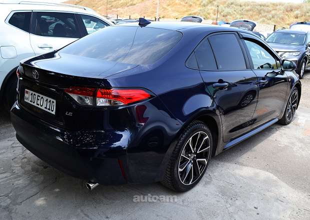 Toyota Corolla 2023 — լուսանկար 13