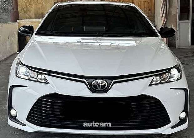 Toyota Corolla 2023 — լուսանկար 9