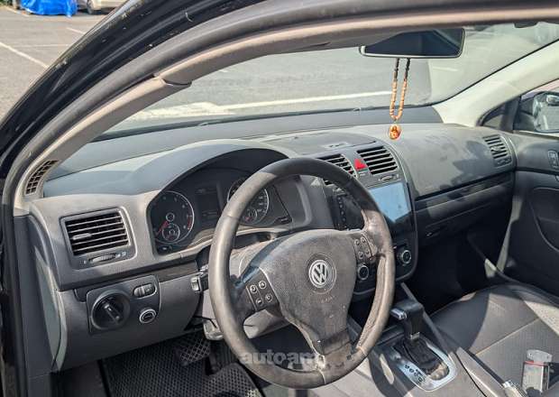 Volkswagen Jetta 2009 — լուսանկար 8