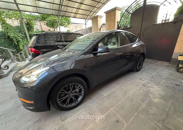 Tesla Model Y 2024 — photo 10