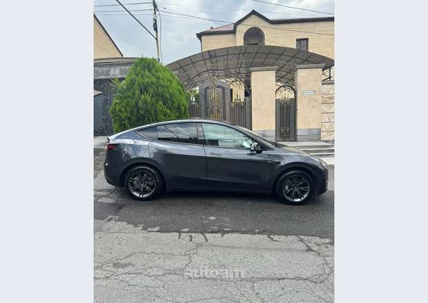 Tesla Model Y 2024 — photo 7