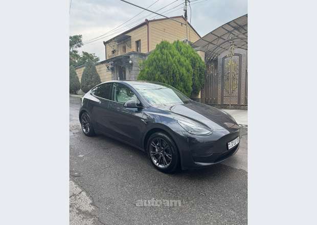 Tesla Model Y 2024 — photo 9