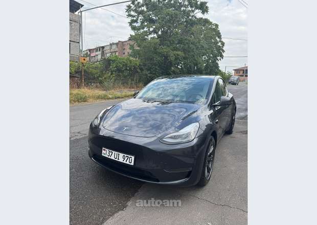Tesla Model Y 2024 — photo 2