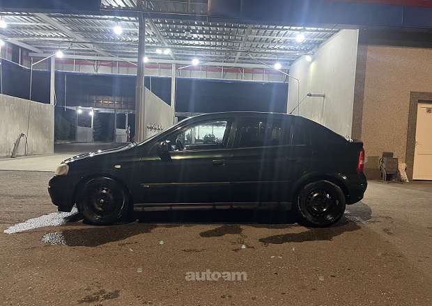 Opel Astra 1999 — լուսանկար 4
