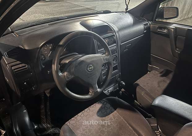 Opel Astra 1999 — լուսանկար 7