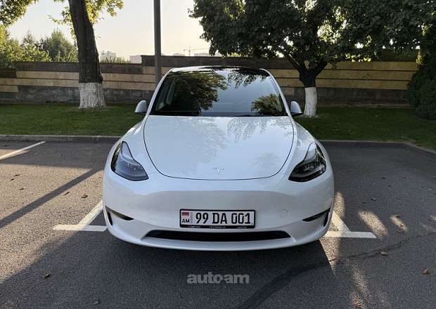 Tesla Model Y 2023 — լուսանկար 2