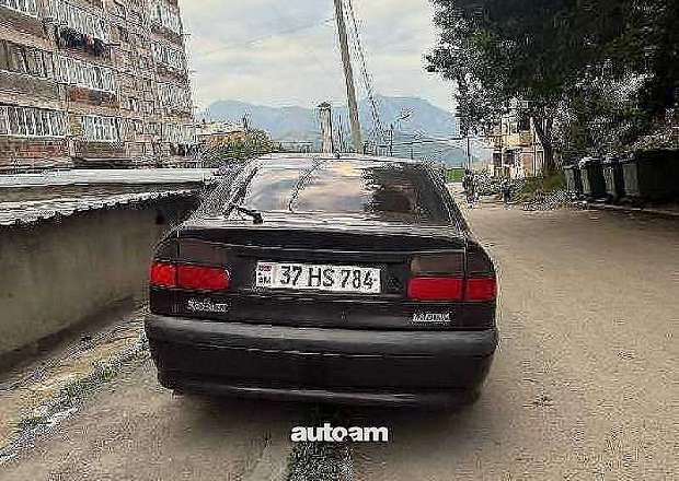 Renault Laguna 1994 — լուսանկար 4