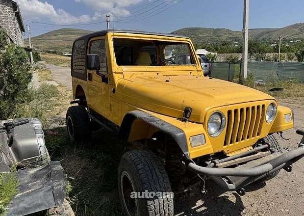 Jeep Wrangler 2000 — photo 4