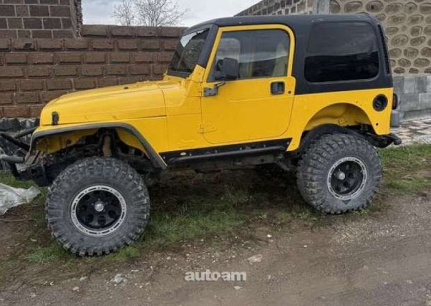Jeep Wrangler 2000 — photo 2