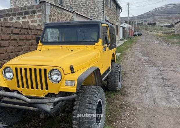 Jeep Wrangler 2000 — photo 3
