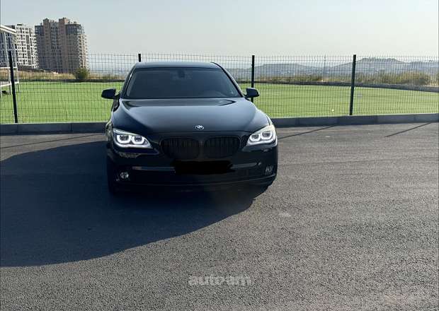 BMW 740 2011 — լուսանկար 1