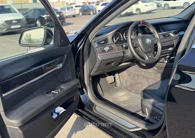 BMW 740 2011 — լուսանկար 8