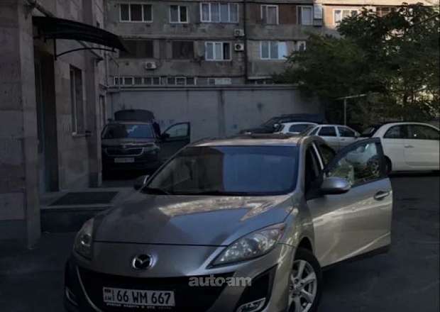 Mazda 3 2011 — լուսանկար 1