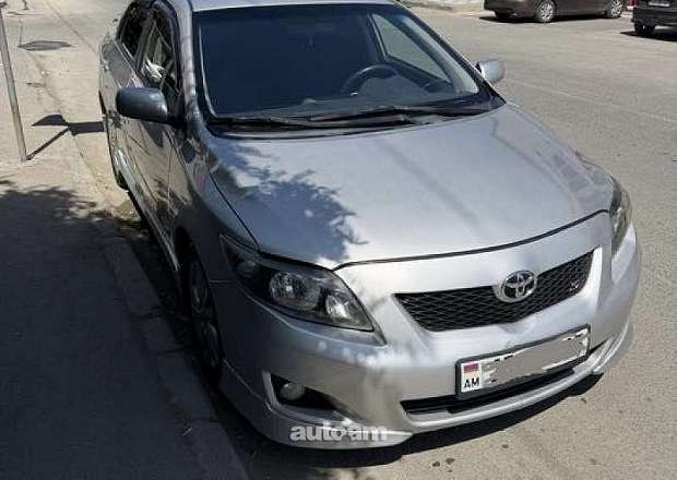 Toyota Corolla 2010 — photo 1