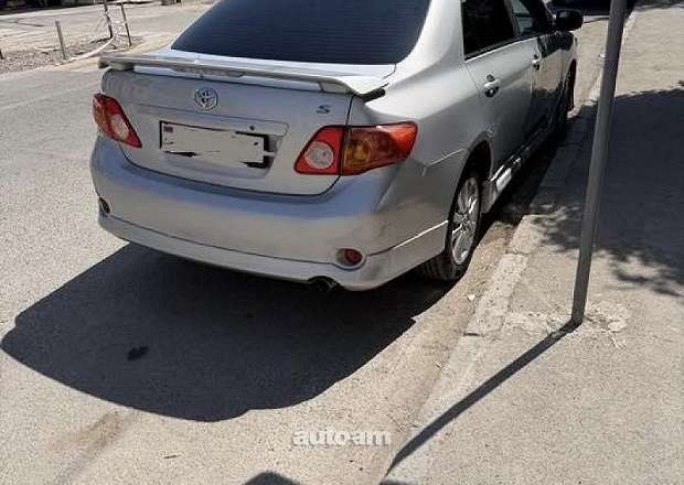 Toyota Corolla 2010 — photo 2
