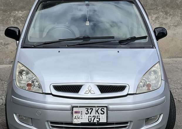 Mitsubishi Colt 2002 — լուսանկար 1