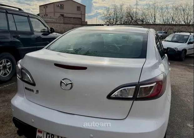 Mazda 3 2010 — լուսանկար 6