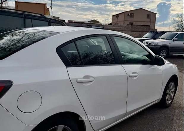 Mazda 3 2010 — լուսանկար 5