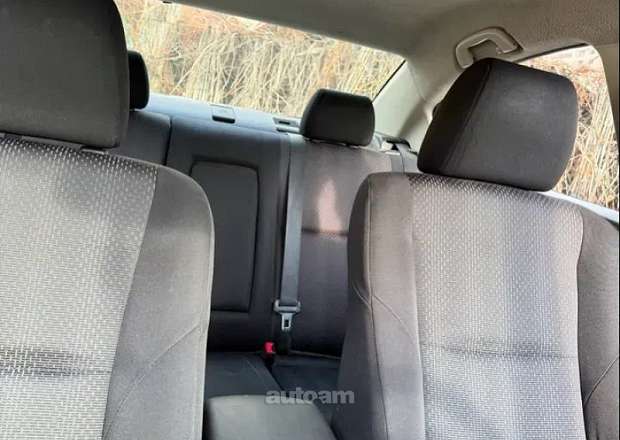 Mazda 3 2010 — լուսանկար 12