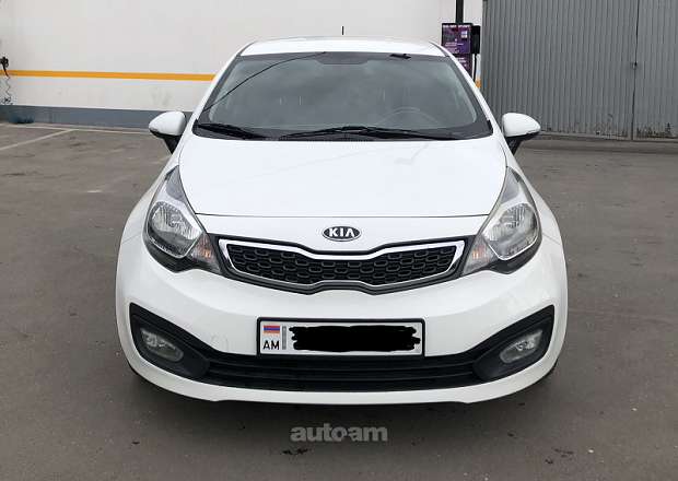 Kia Rio 2013 — photo 1