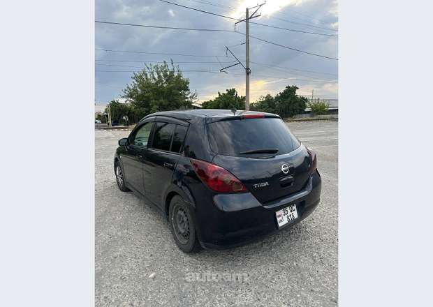 Nissan Tiida 2006 — photo 1