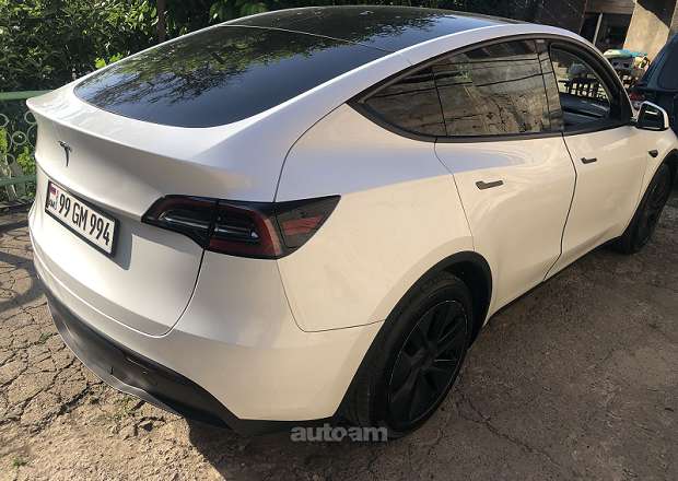 Tesla Model Y 2024 — photo 4