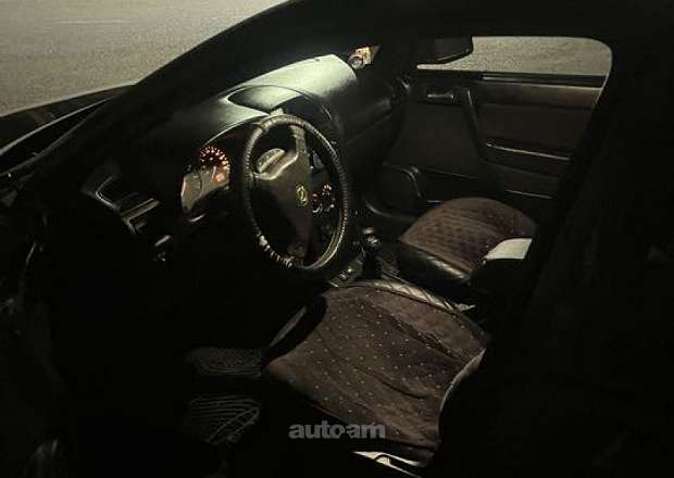 Opel Astra 1998 — լուսանկար 7