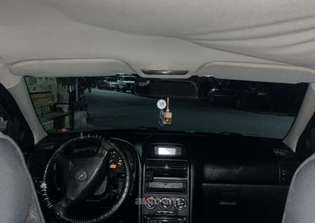 Opel Astra 1998 — լուսանկար 5
