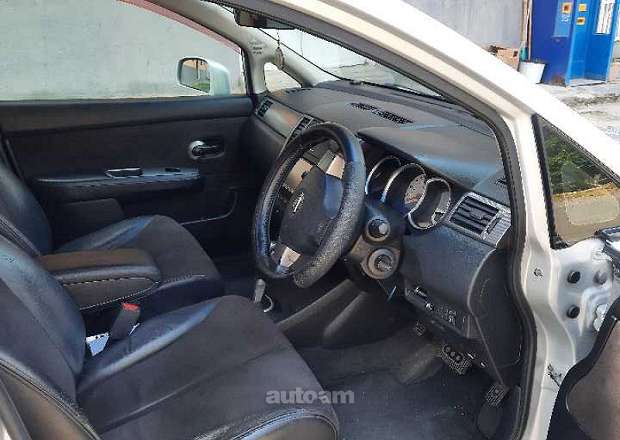 Nissan Tiida 2009 — լուսանկար 5